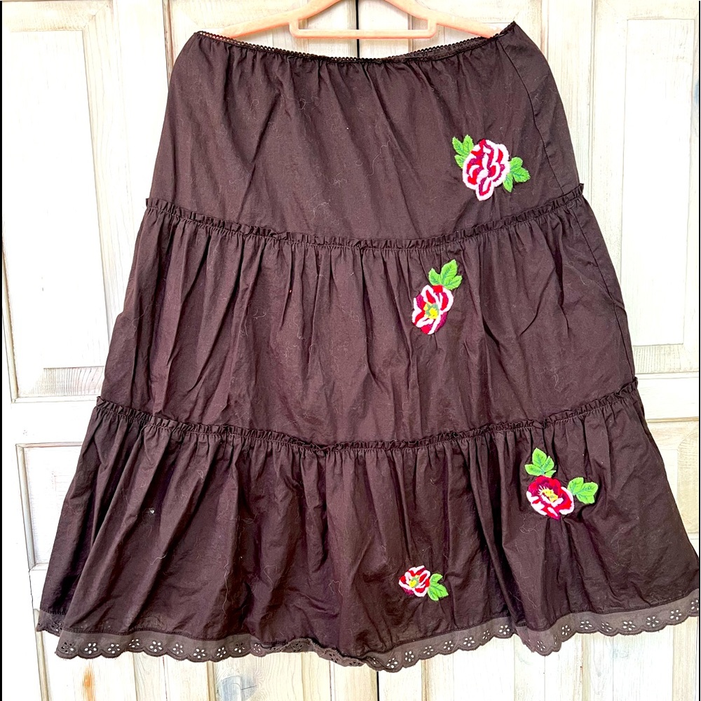 Cute dark brown prairie skirt with embroidered roses.